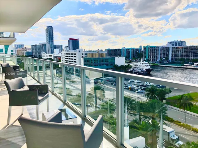 a view of a lake from a balcony