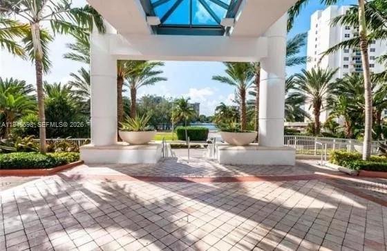 a view of a pathway with a patio