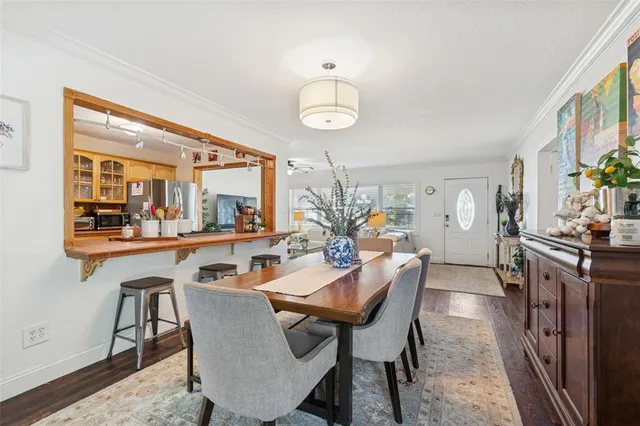 a view of a dining room with furniture
