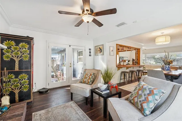 a living room with furniture and a table
