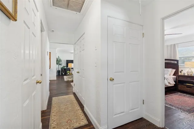a view of a livingroom from a hallway