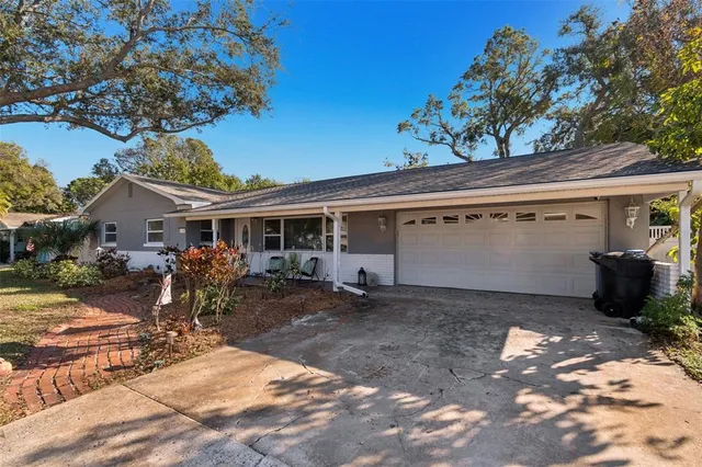 a front view of a house with a patio