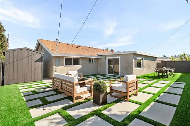 a garden view with a seating space