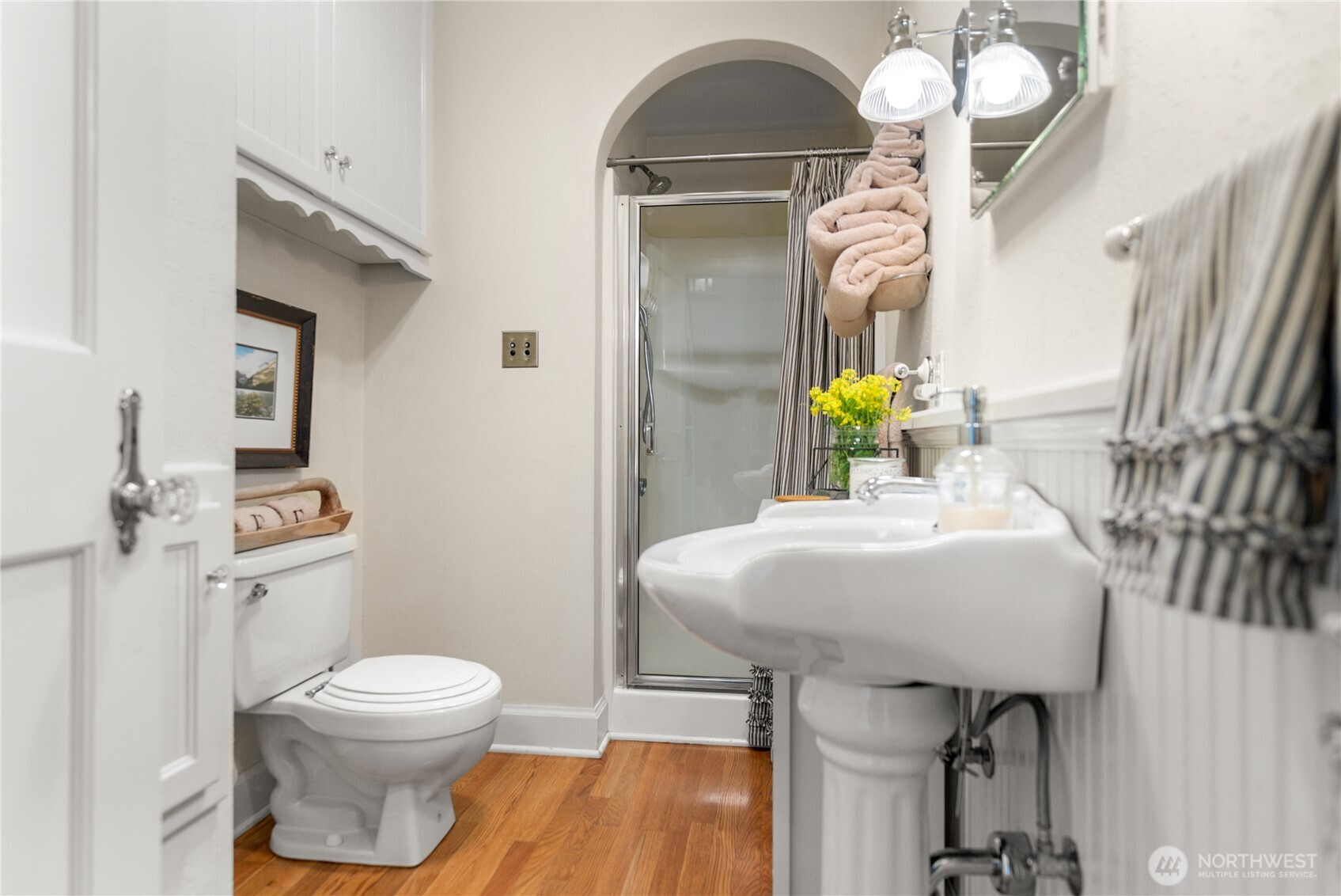 3 A Ross Road Twisp, WA 98856 - Photo 14 of 40 a bathroom with a sink a toilet and a mirror