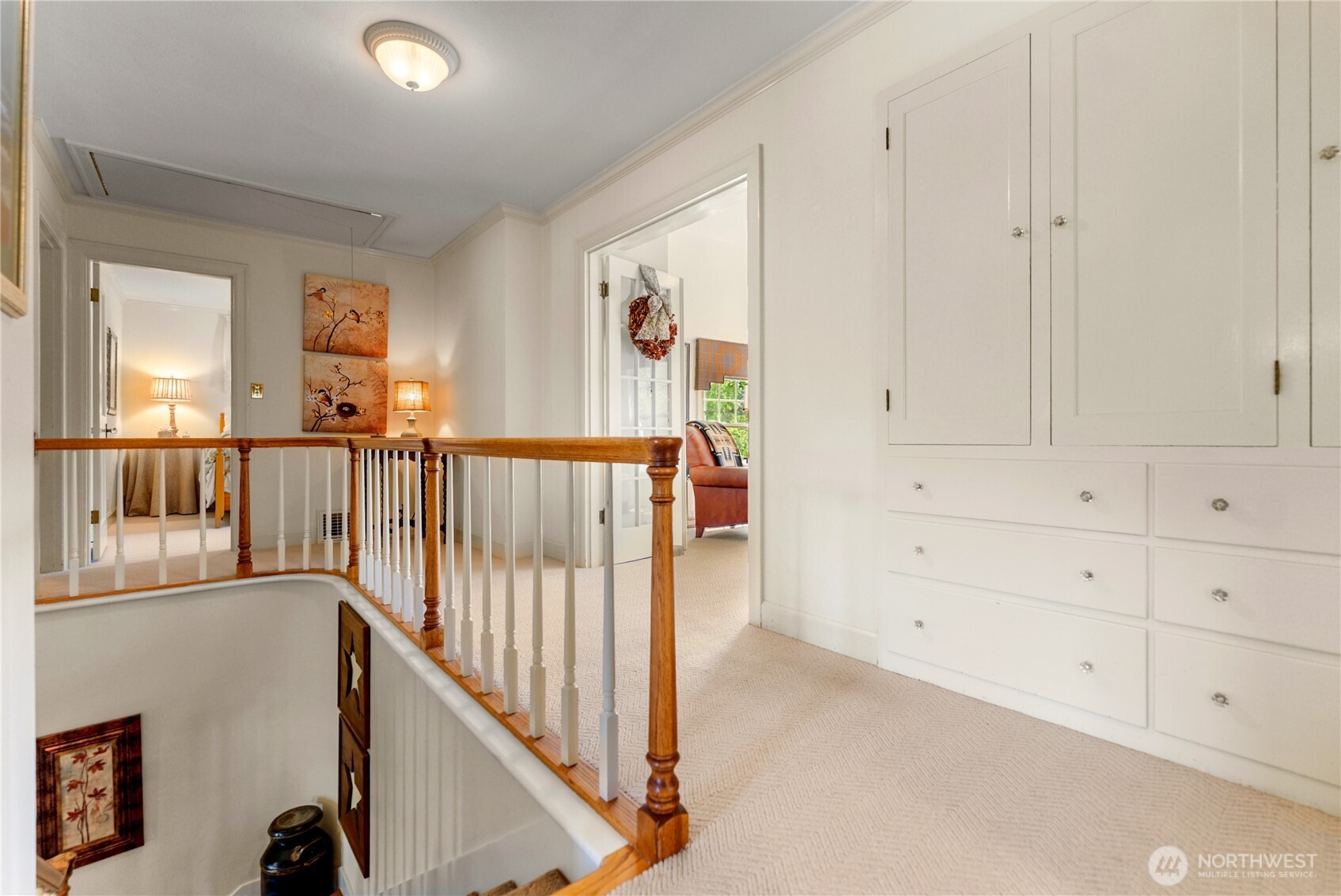 3 A Ross Road Twisp, WA 98856 - Photo 22 of 40 a view of a hallway to a livingroom with wooden floor windows