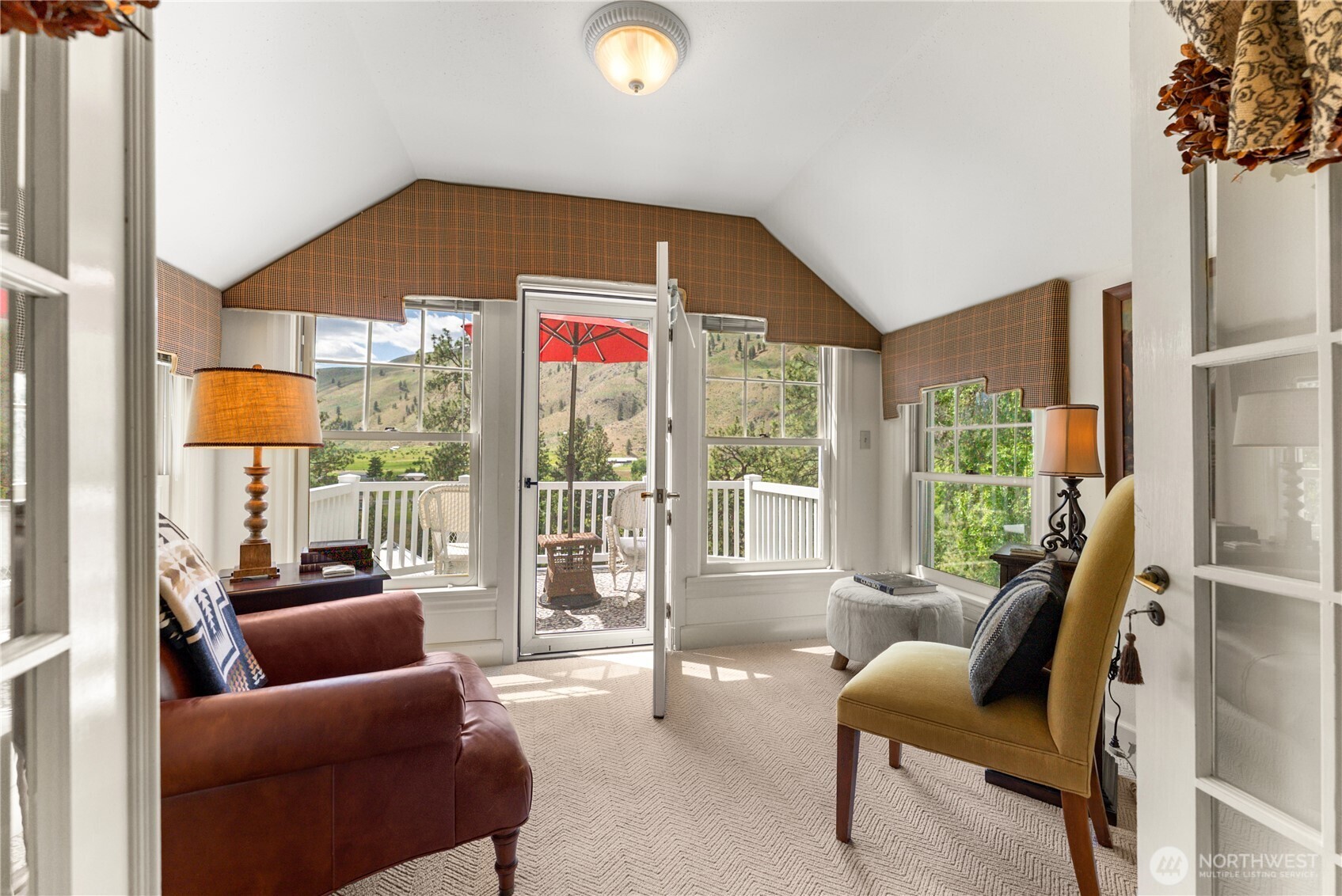 3 A Ross Road Twisp, WA 98856 - Photo 25 of 40 a bedroom with furniture and a large window