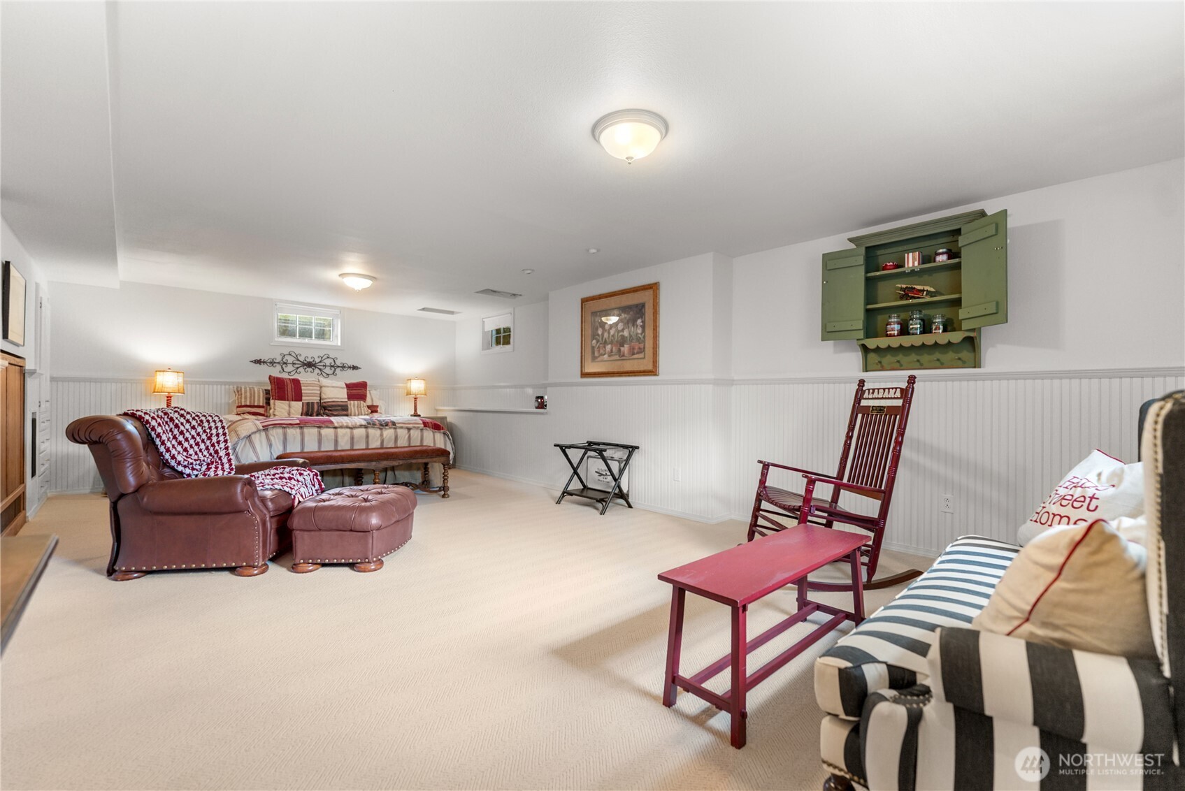 3 A Ross Road Twisp, WA 98856 - Photo 29 of 40 a room with furniture a rug and a projector