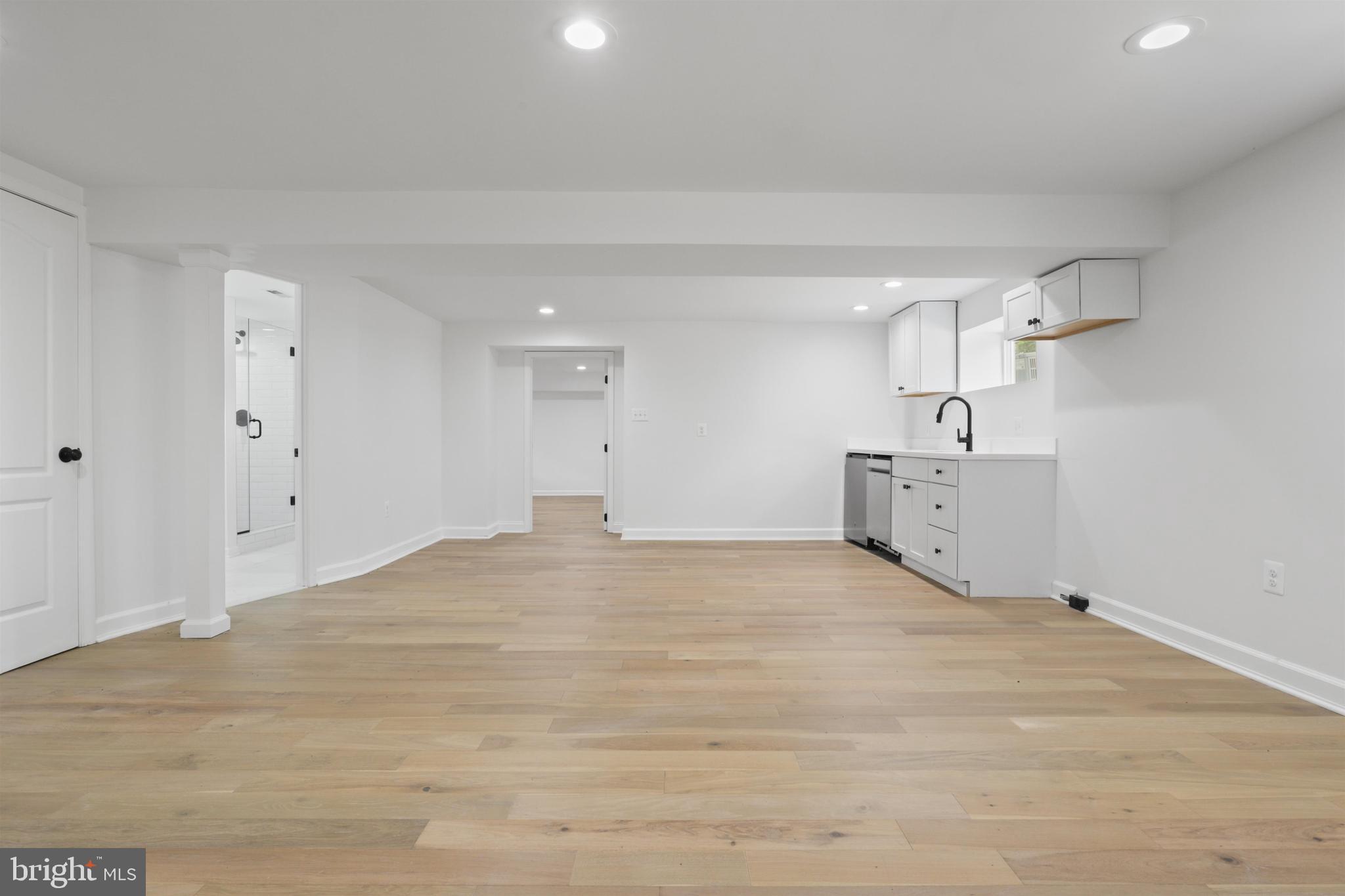 438 Ethan Allen Avenue Takoma Park, MD 20912 - Photo 26 of 47 a large white bed in a white room