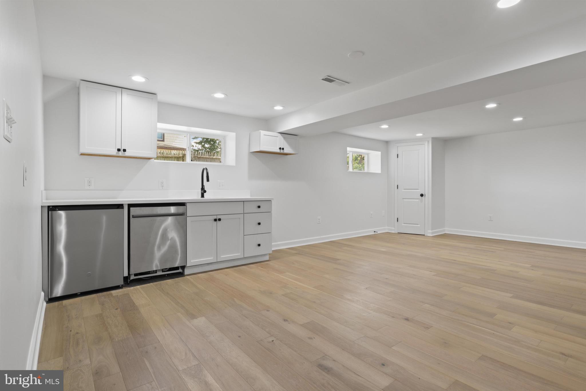 438 Ethan Allen Avenue Takoma Park, MD 20912 - Photo 27 of 47 a view of a kitchen with white cabinets