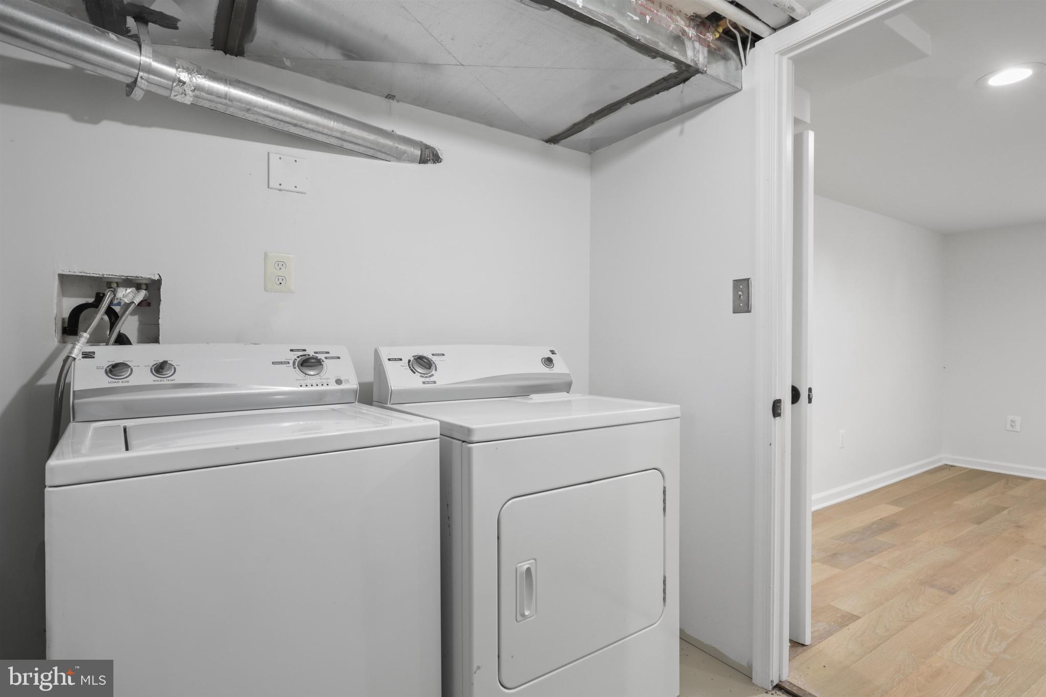 438 Ethan Allen Avenue Takoma Park, MD 20912 - Photo 30 of 47 a utility room with dryer and washer