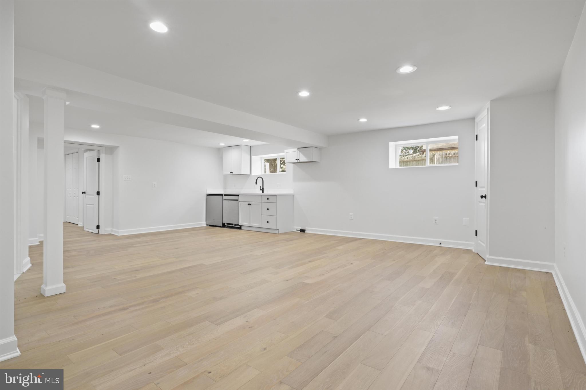 438 Ethan Allen Avenue Takoma Park, MD 20912 - Photo 31 of 47 a view of empty room with wooden floor