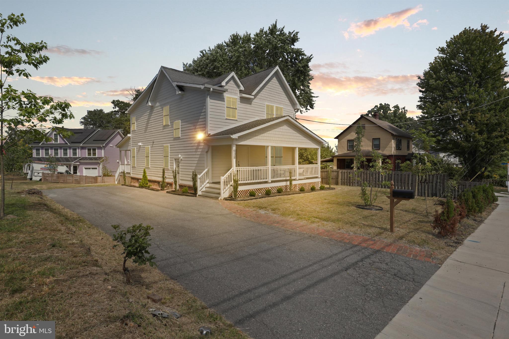 438 Ethan Allen Avenue Takoma Park, MD 20912 - Photo 43 of 47 a view of a large house with a yard