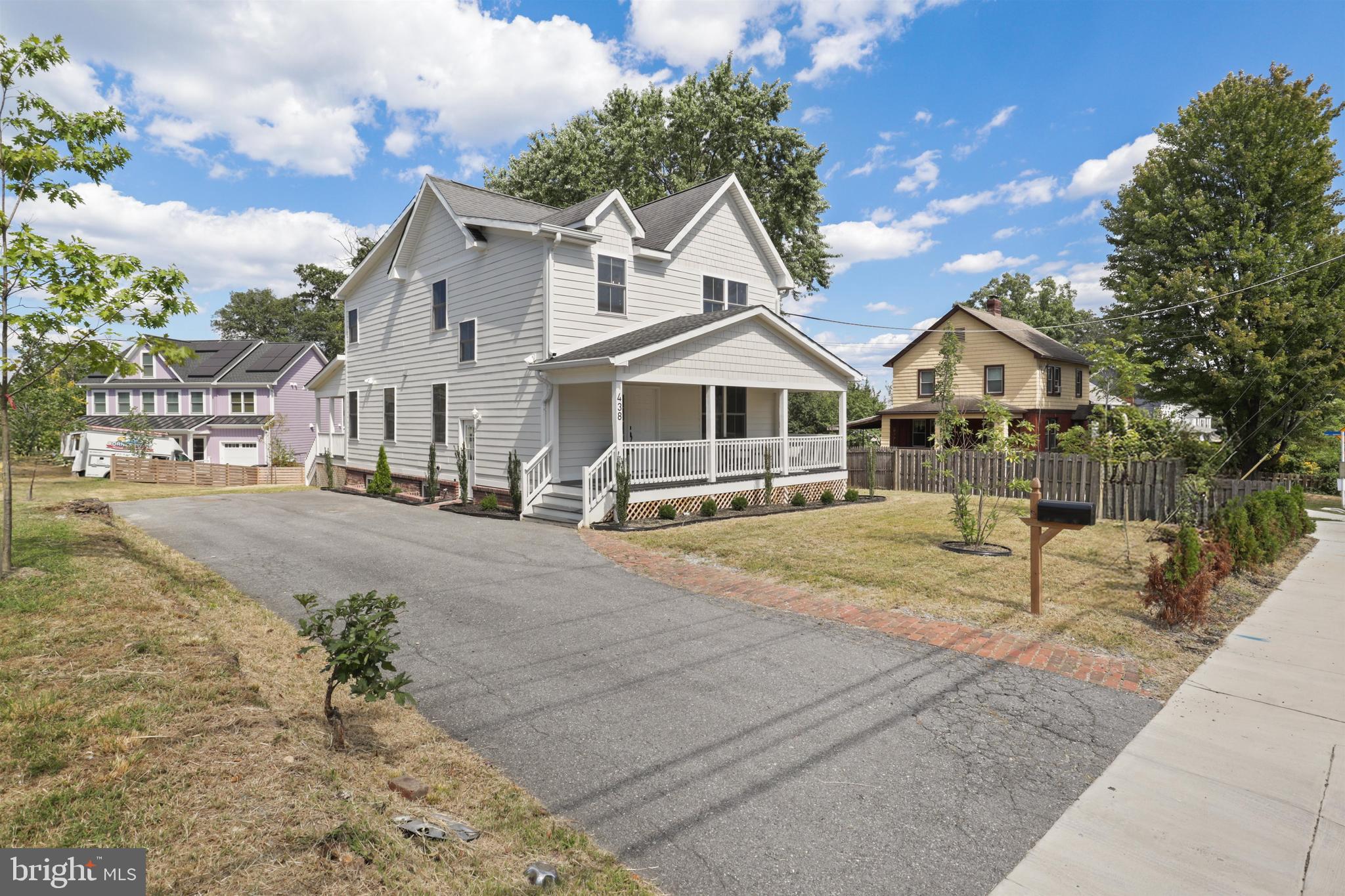 438 Ethan Allen Avenue Takoma Park, MD 20912 - Photo 46 of 47 a front view of a house with a yard