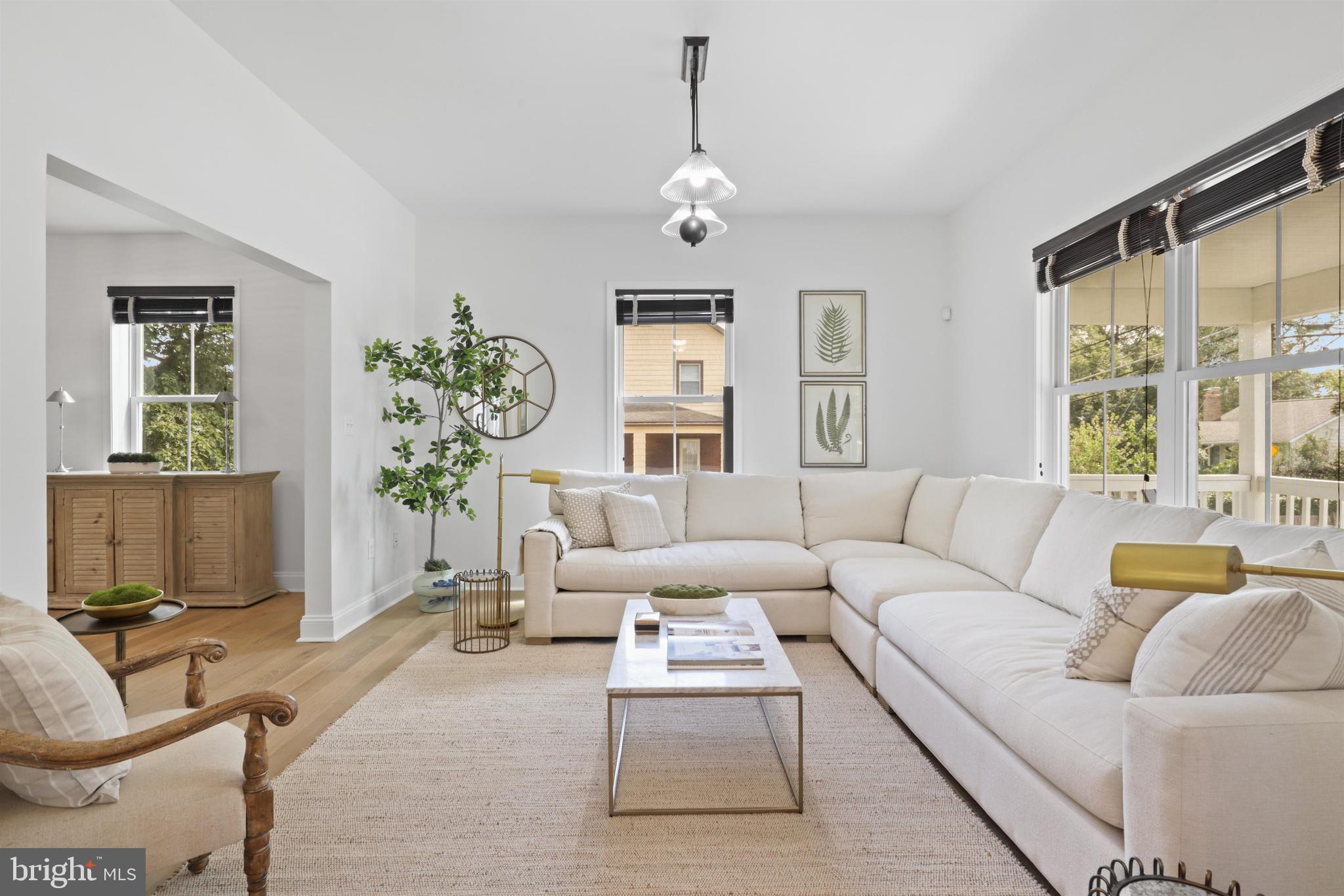 438 Ethan Allen Avenue Takoma Park, MD 20912 - Photo 5 of 47 a living room with furniture and a large window