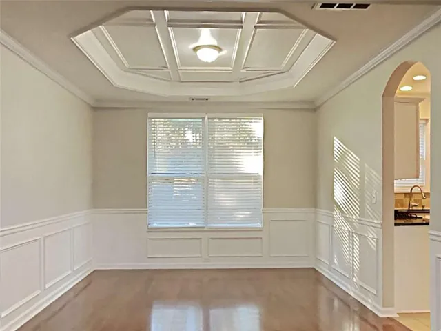 a view of empty room with windows