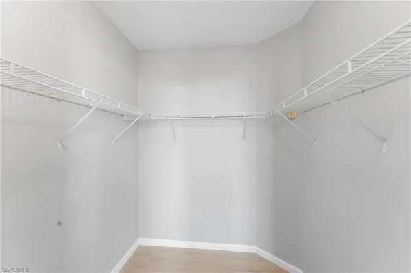 a view of an empty walk in closet