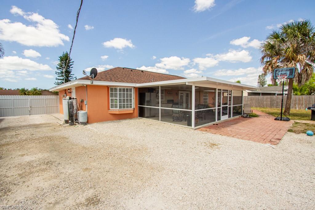 2950 46th Street Southwest Naples, FL 34116 - Photo 4 of 27 Come in and play some basketball with the Family.