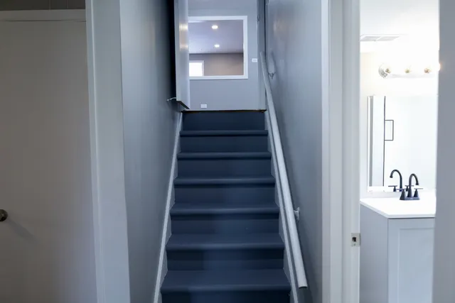 a view of a hallway with front door