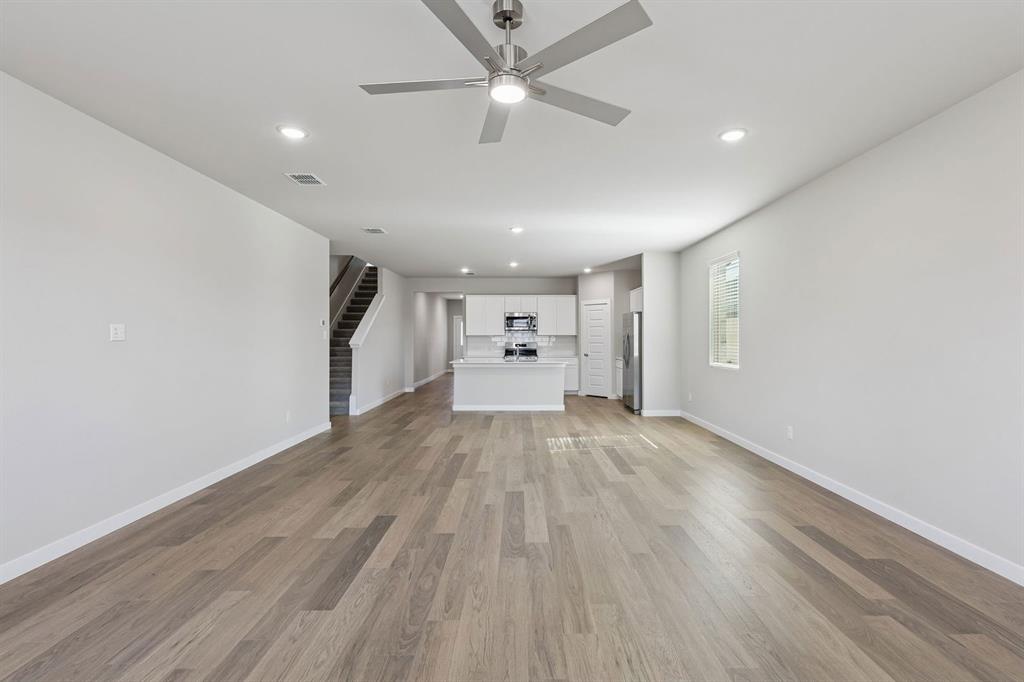 7716 Kingfisher Road Aubrey, TX 76227 - Photo 12 of 39 Open First Floor in the Holden home plan by Trophy Signature Homes – REPRESENTATIVE PHOTO