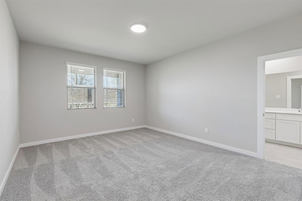 7716 Kingfisher Road Aubrey, TX 76227 - Photo 22 of 39 Primary Suite in the Holden home plan by Trophy Signature Homes – REPRESENTATIVE PHOTO