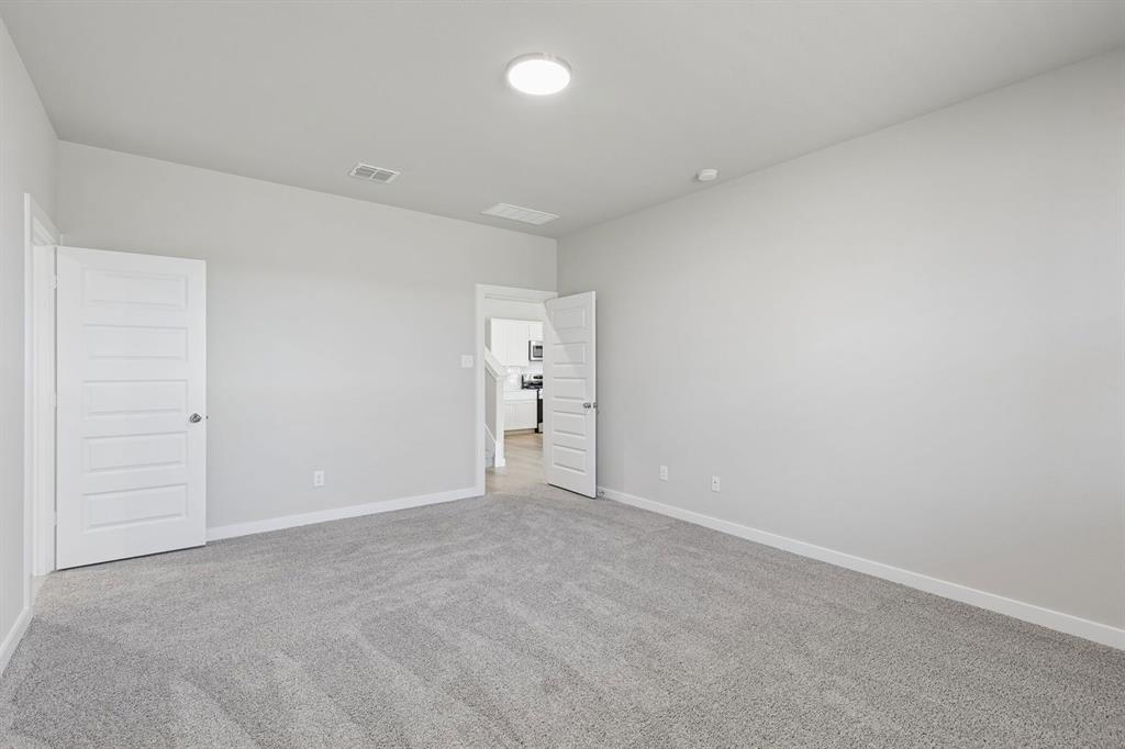 7716 Kingfisher Road Aubrey, TX 76227 - Photo 24 of 39 Primary Suite in the Holden home plan by Trophy Signature Homes – REPRESENTATIVE PHOTO