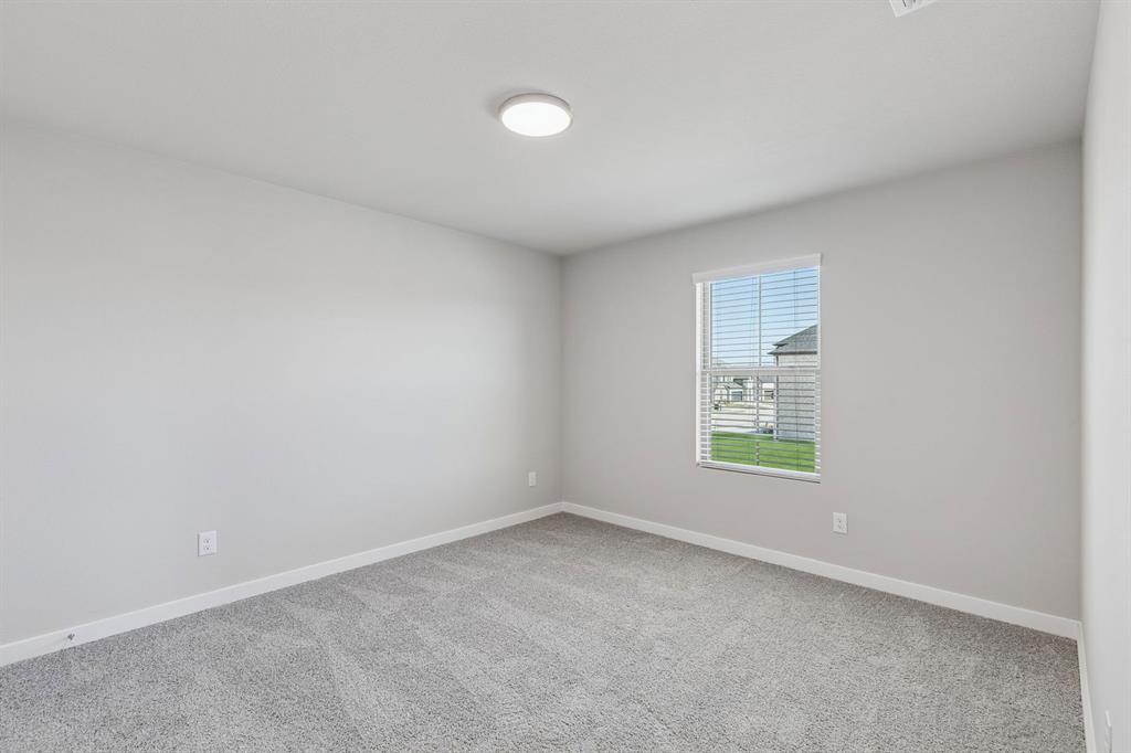 7716 Kingfisher Road Aubrey, TX 76227 - Photo 32 of 39 Bedroom in the Holden home plan by Trophy Signature Homes – REPRESENTATIVE PHOTO