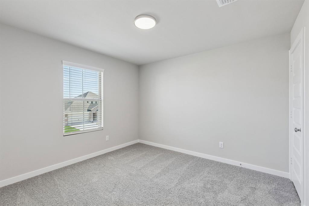 7716 Kingfisher Road Aubrey, TX 76227 - Photo 34 of 39 Bedroom in the Holden home plan by Trophy Signature Homes – REPRESENTATIVE PHOTO