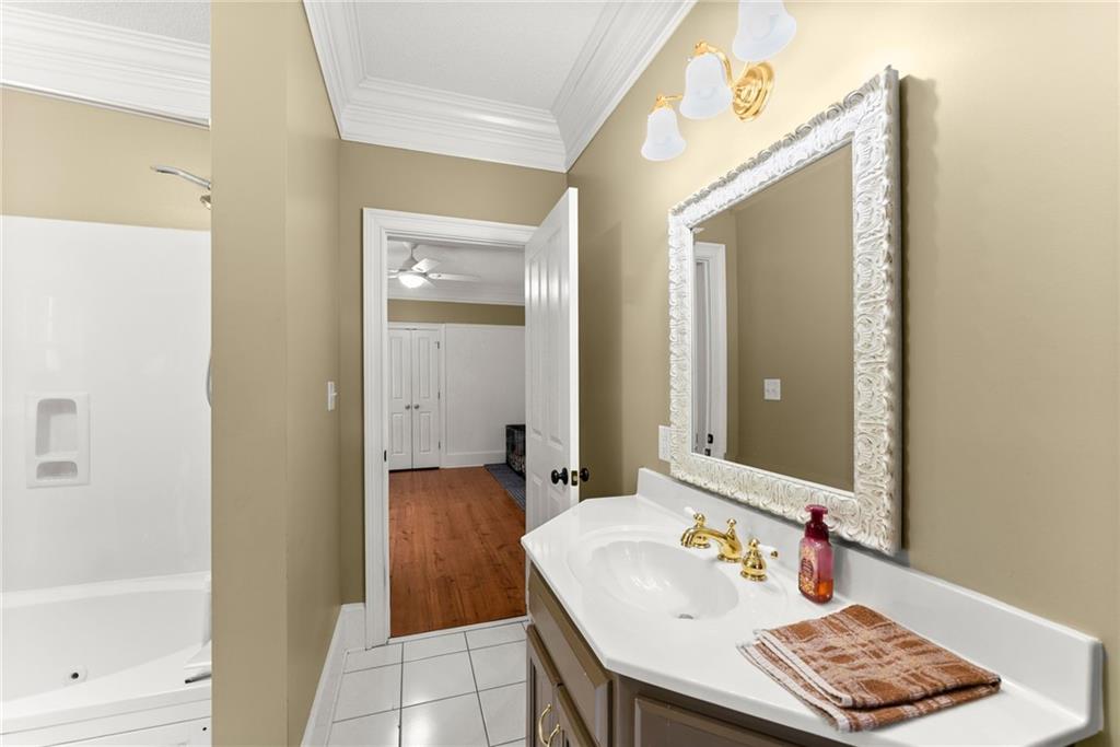 2832 B B Wilson Road Commerce, GA 30529 - Photo 27 of 96 a bathroom with a sink and a mirror