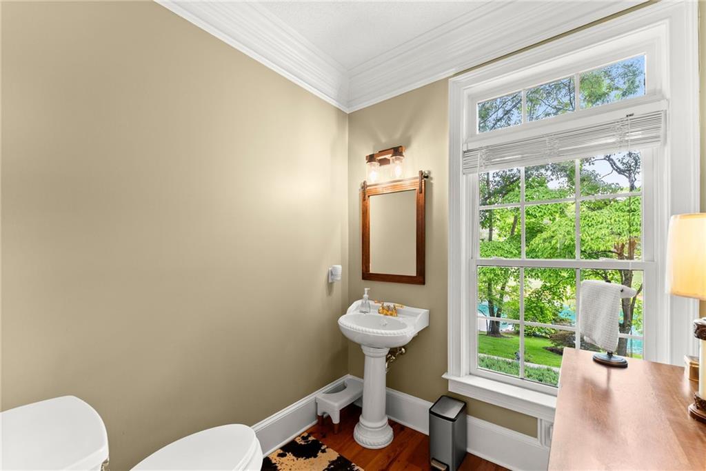 2832 B B Wilson Road Commerce, GA 30529 - Photo 33 of 96 a bathroom with a sink toilet and a mirror