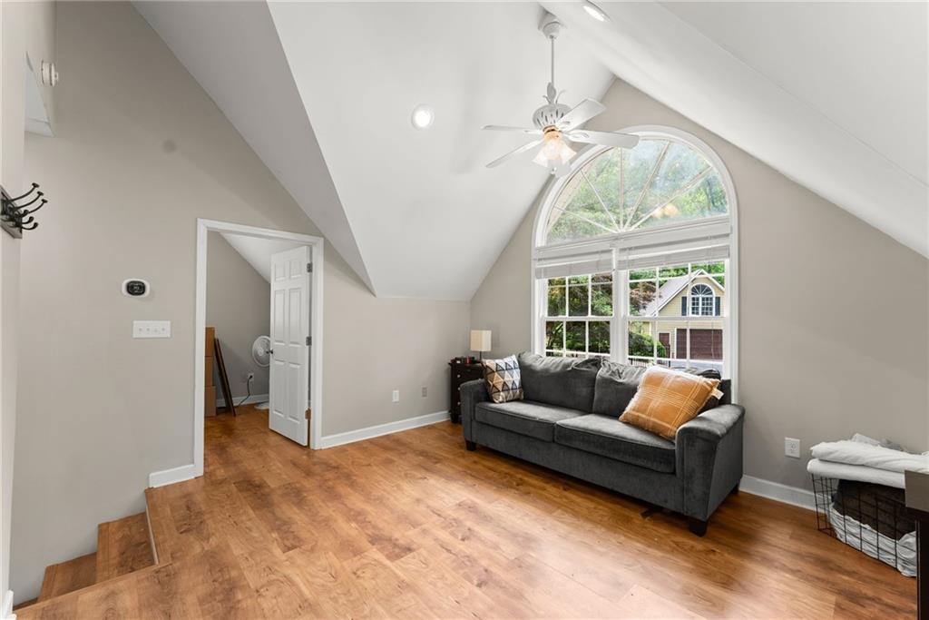 2832 B B Wilson Road Commerce, GA 30529 - Photo 42 of 96 a living room with furniture and a large window