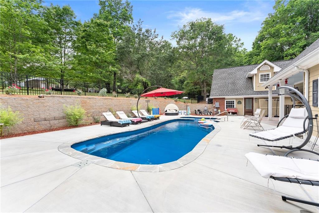2832 B B Wilson Road Commerce, GA 30529 - Photo 69 of 96 a view of outdoor space yard swimming pool and patio