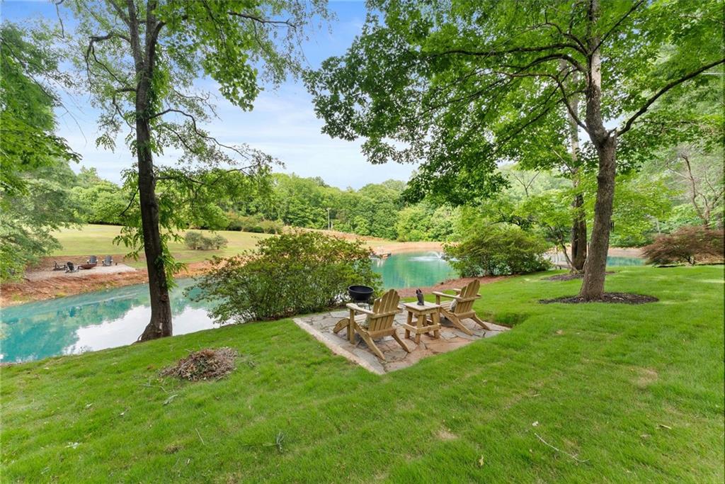 2832 B B Wilson Road Commerce, GA 30529 - Photo 82 of 96 a view of a table and chairs in the garden