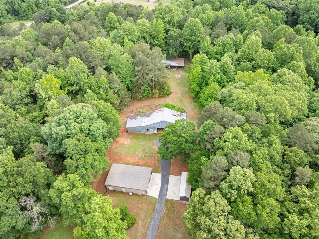 2832 B B Wilson Road Commerce, GA 30529 - Photo 94 of 96 an aerial view of residential house with outdoor space and trees all around