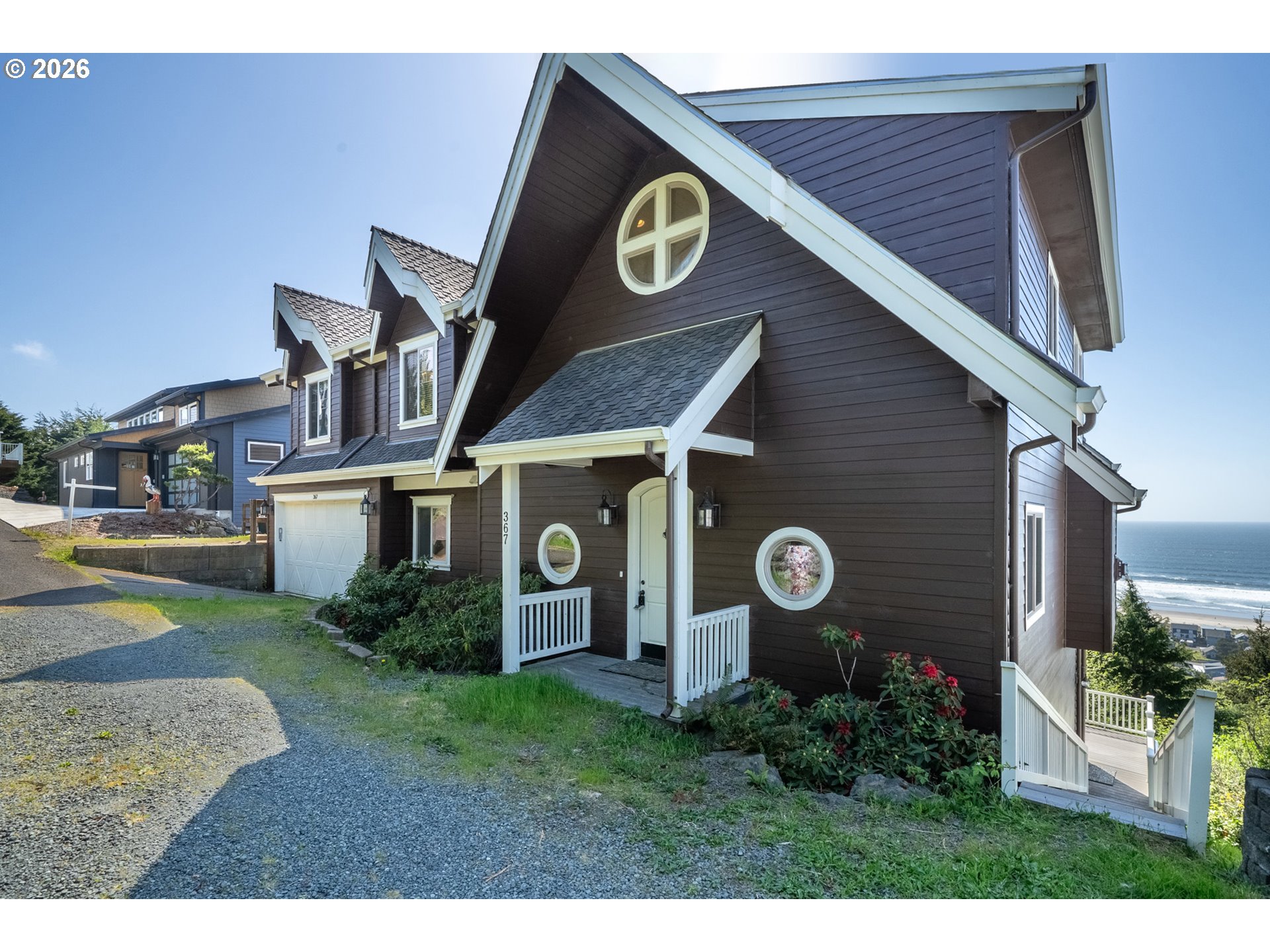 367 South Longview Loop Rockaway Beach, OR 97136 - Photo 1 of 48 a view of a house with a yard and pathway