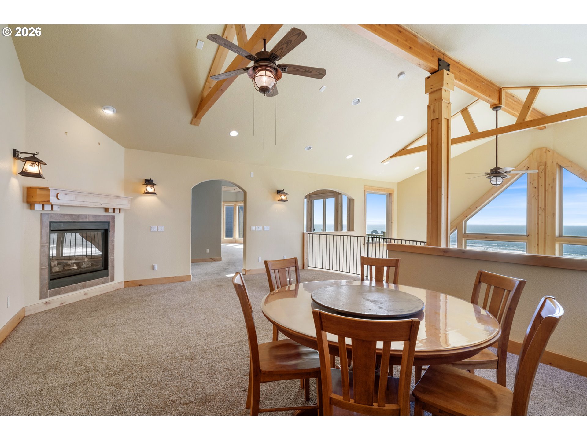367 South Longview Loop Rockaway Beach, OR 97136 - Photo 21 of 48 a dining room with furniture and a chandelier