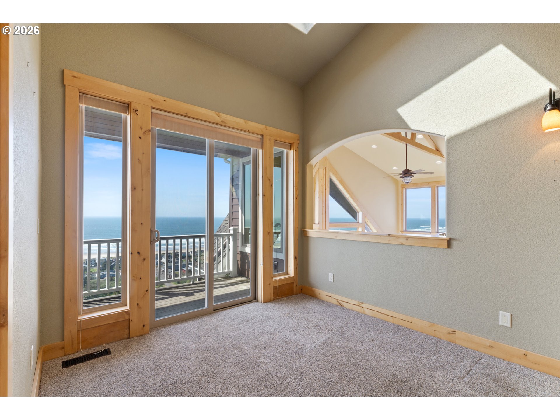 367 South Longview Loop Rockaway Beach, OR 97136 - Photo 23 of 48 a view of empty room with windows