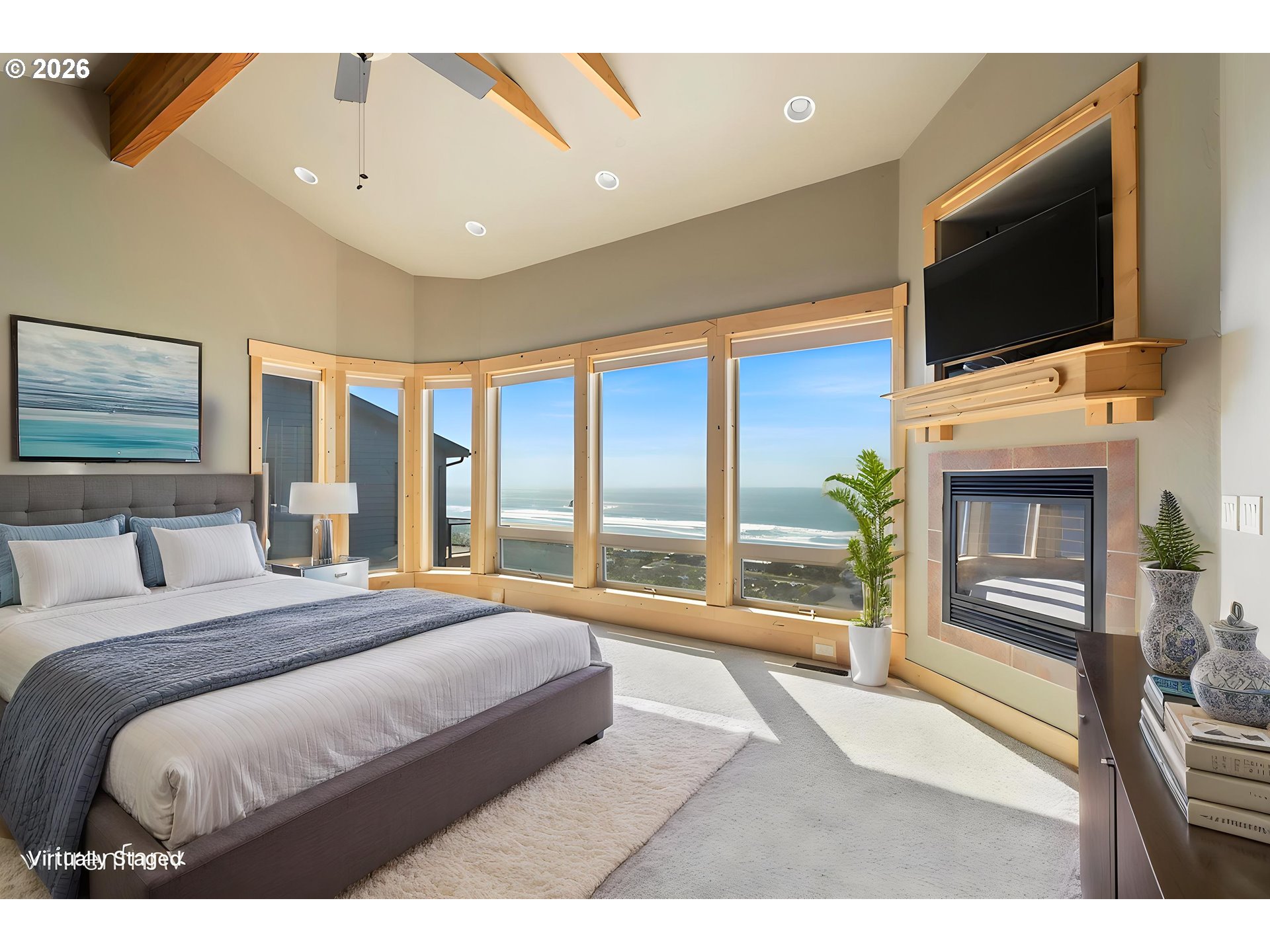 367 South Longview Loop Rockaway Beach, OR 97136 - Photo 25 of 48 a bedroom with a bed and a flat screen tv