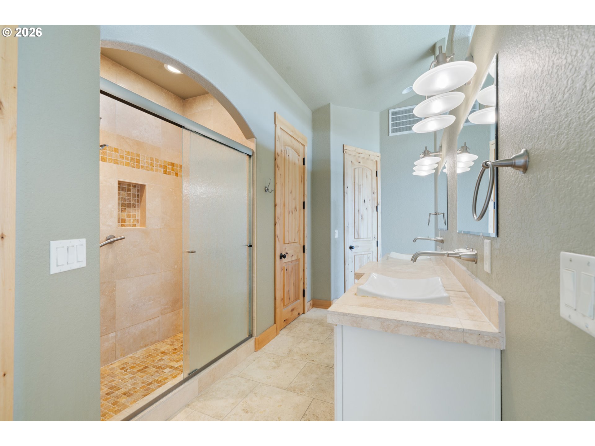 367 South Longview Loop Rockaway Beach, OR 97136 - Photo 29 of 48 a bathroom with a sink mirror and a shower