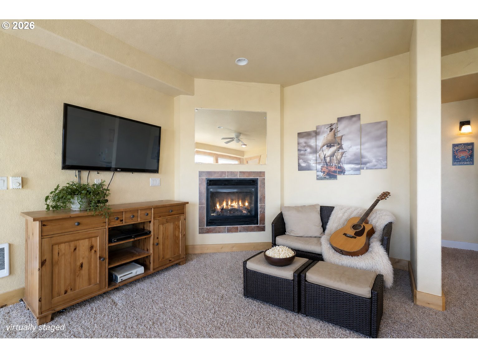367 South Longview Loop Rockaway Beach, OR 97136 - Photo 36 of 48 a living room with furniture and a flat screen tv