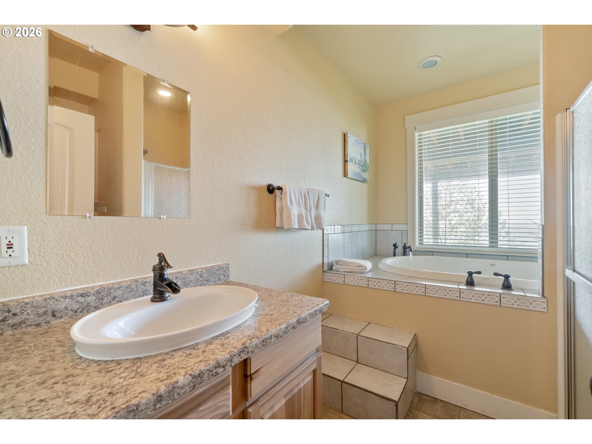 367 South Longview Loop Rockaway Beach, OR 97136 - Photo 45 of 48 a bathroom with a sink and a mirror