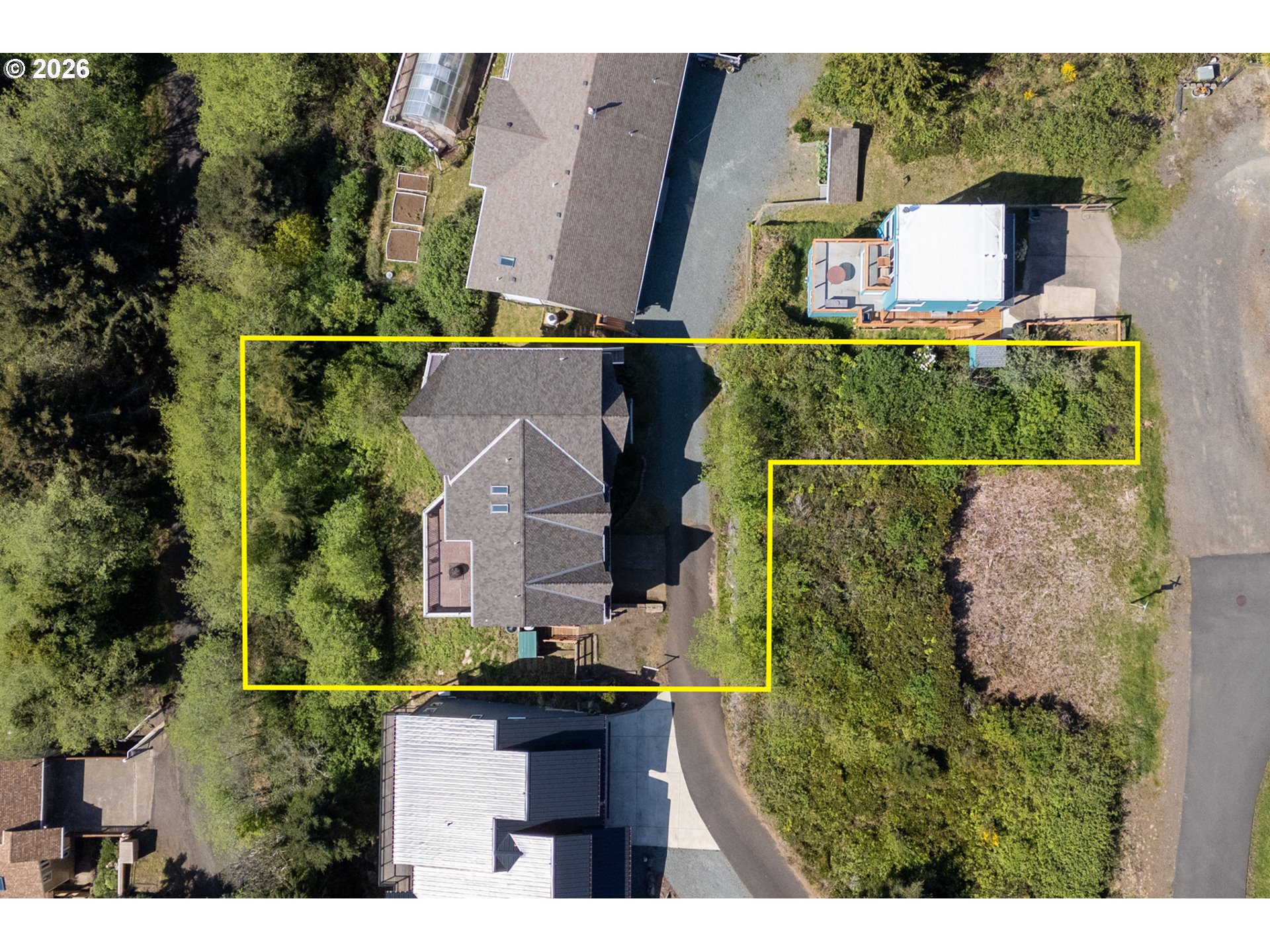 367 South Longview Loop Rockaway Beach, OR 97136 - Photo 47 of 48 an aerial view of a house with a yard
