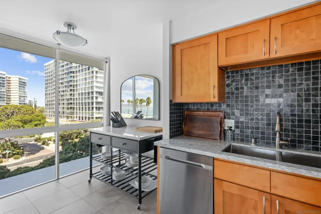 a kitchen with a sink and a stove