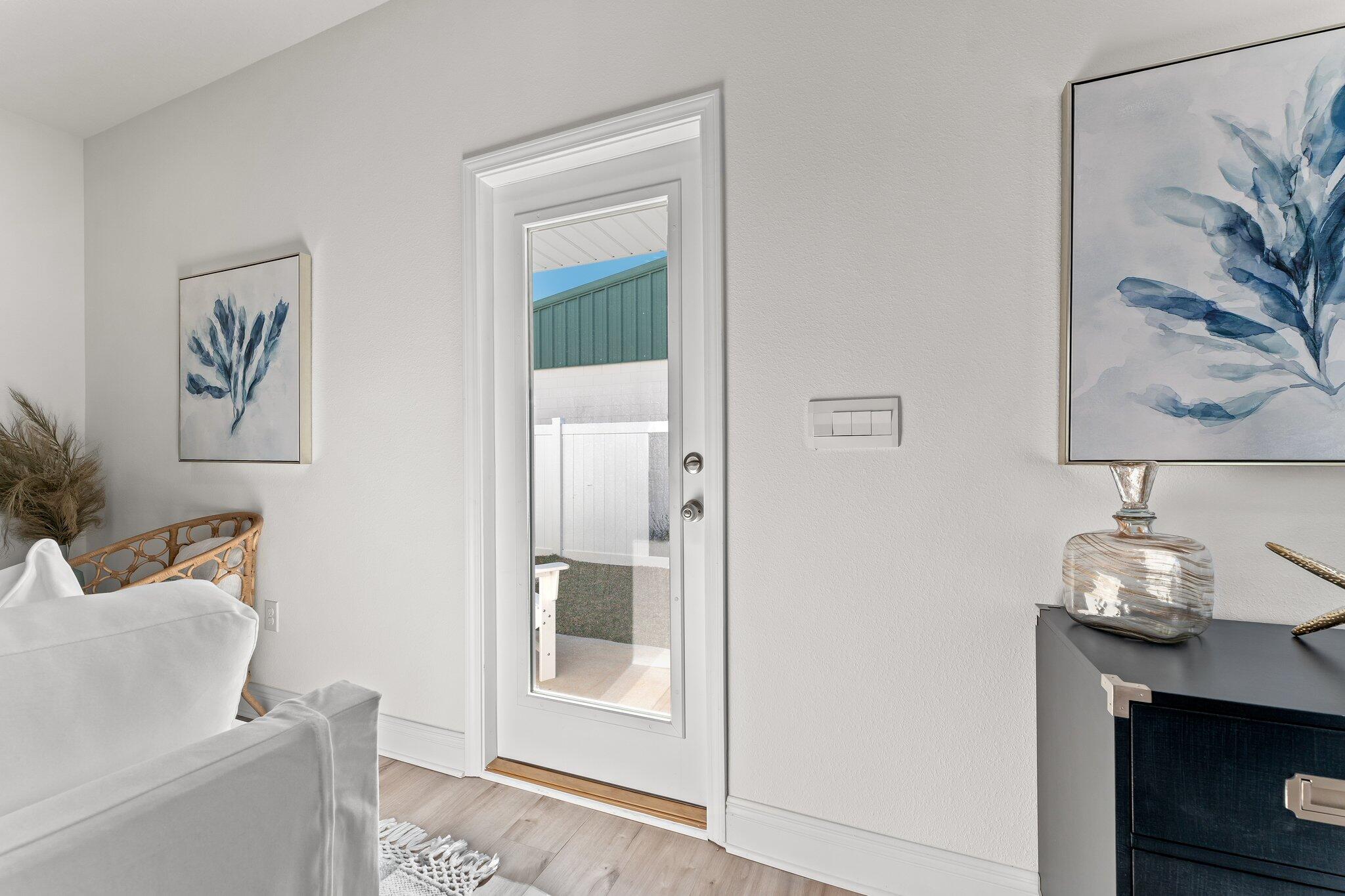 2 Renea Cove, Unit LOT 009 Destin, FL 32541 - Photo 16 of 30 a living room with furniture and a painting on the wall