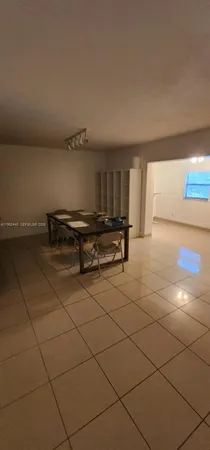 a view of workspace with wooden floor
