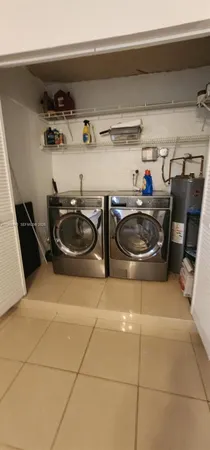 a kitchen with a stove and cabinets