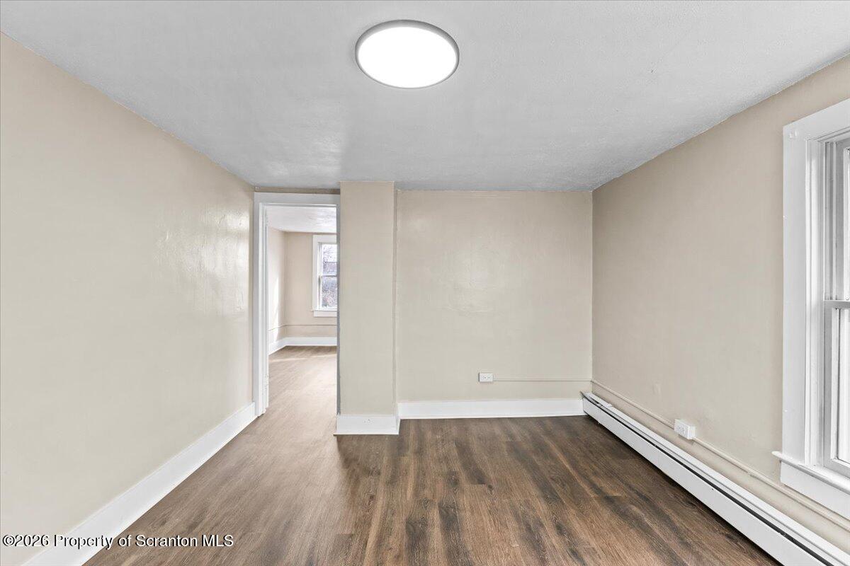 132 Penn Avenue Exeter, PA 18643 - Photo 16 of 44 a view of room with window and wooden floor