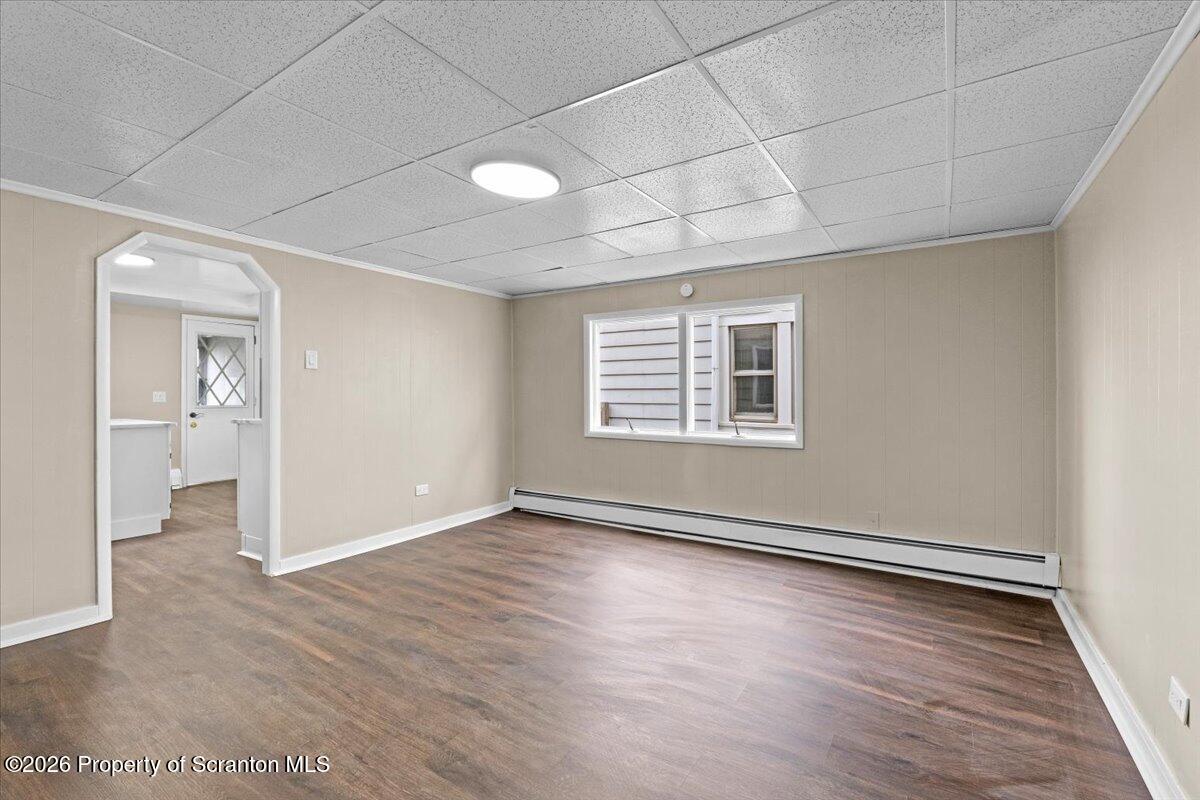 132 Penn Avenue Exeter, PA 18643 - Photo 23 of 44 wooden floor in an empty room with a window