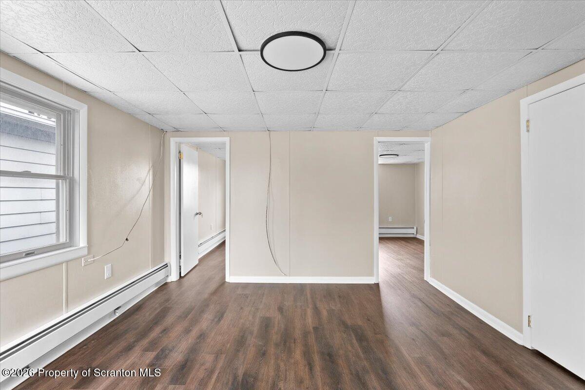 132 Penn Avenue Exeter, PA 18643 - Photo 29 of 44 a view of a room with wooden floor and large window