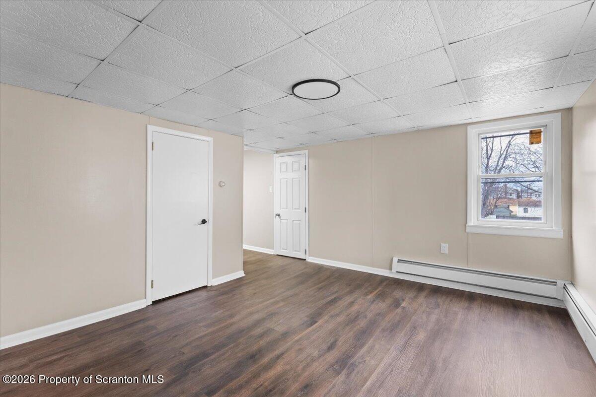 132 Penn Avenue Exeter, PA 18643 - Photo 30 of 44 a view of room with window and wooden floor