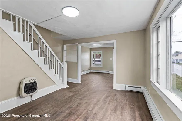 an empty room with windows